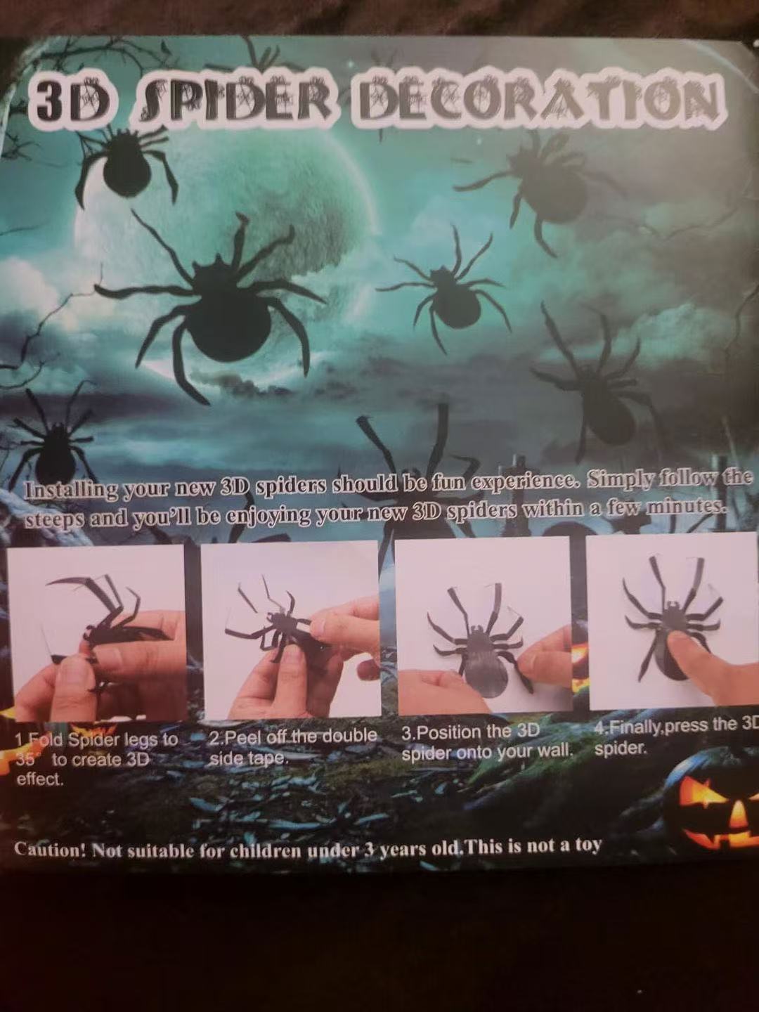 Customer photo showing instructions for 3D spider decorations